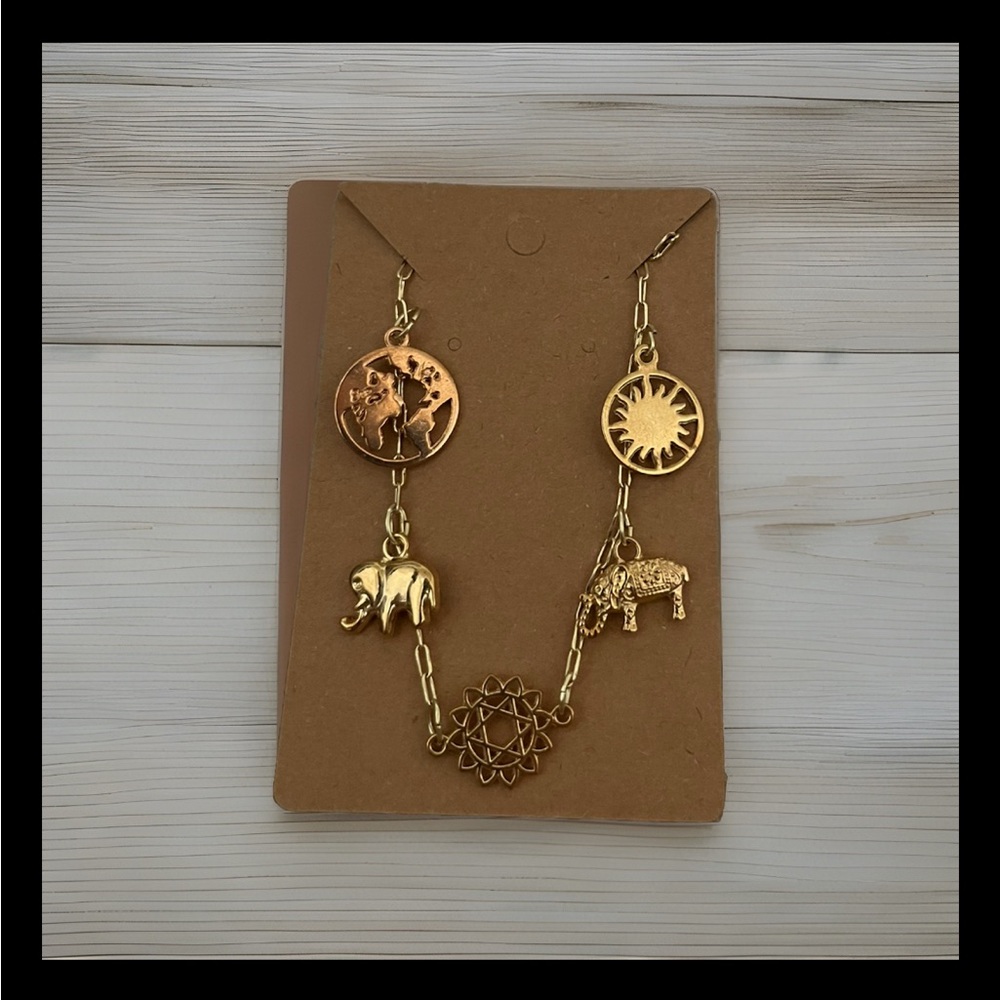 Boho Gold Tone Multi Charm Necklace World Map Elephant Sun Star Unique Jewelry